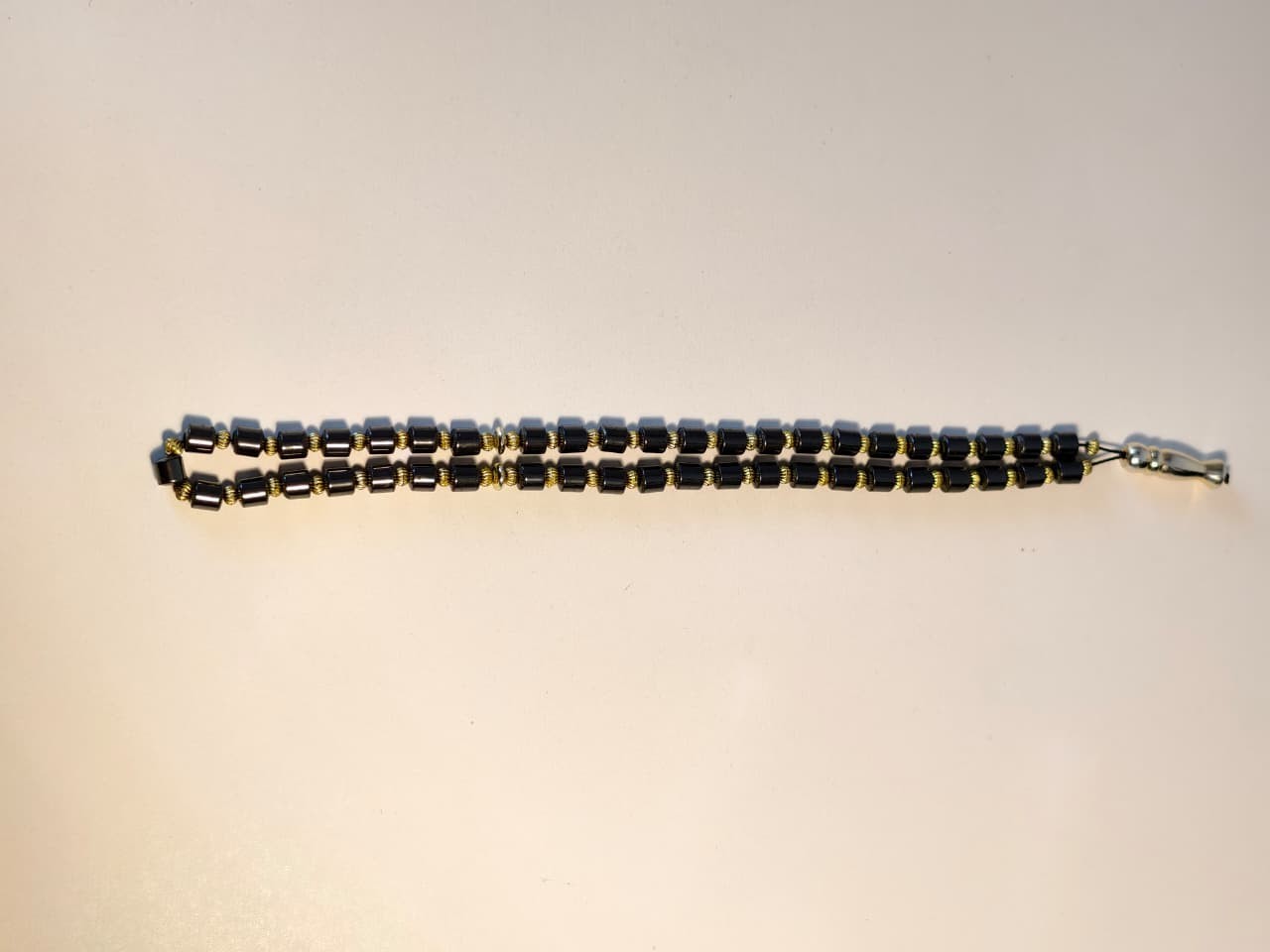 Unique 66-Bead Misbaha with Hematite Style Cylinders, Gold Spacers, Large Tassel