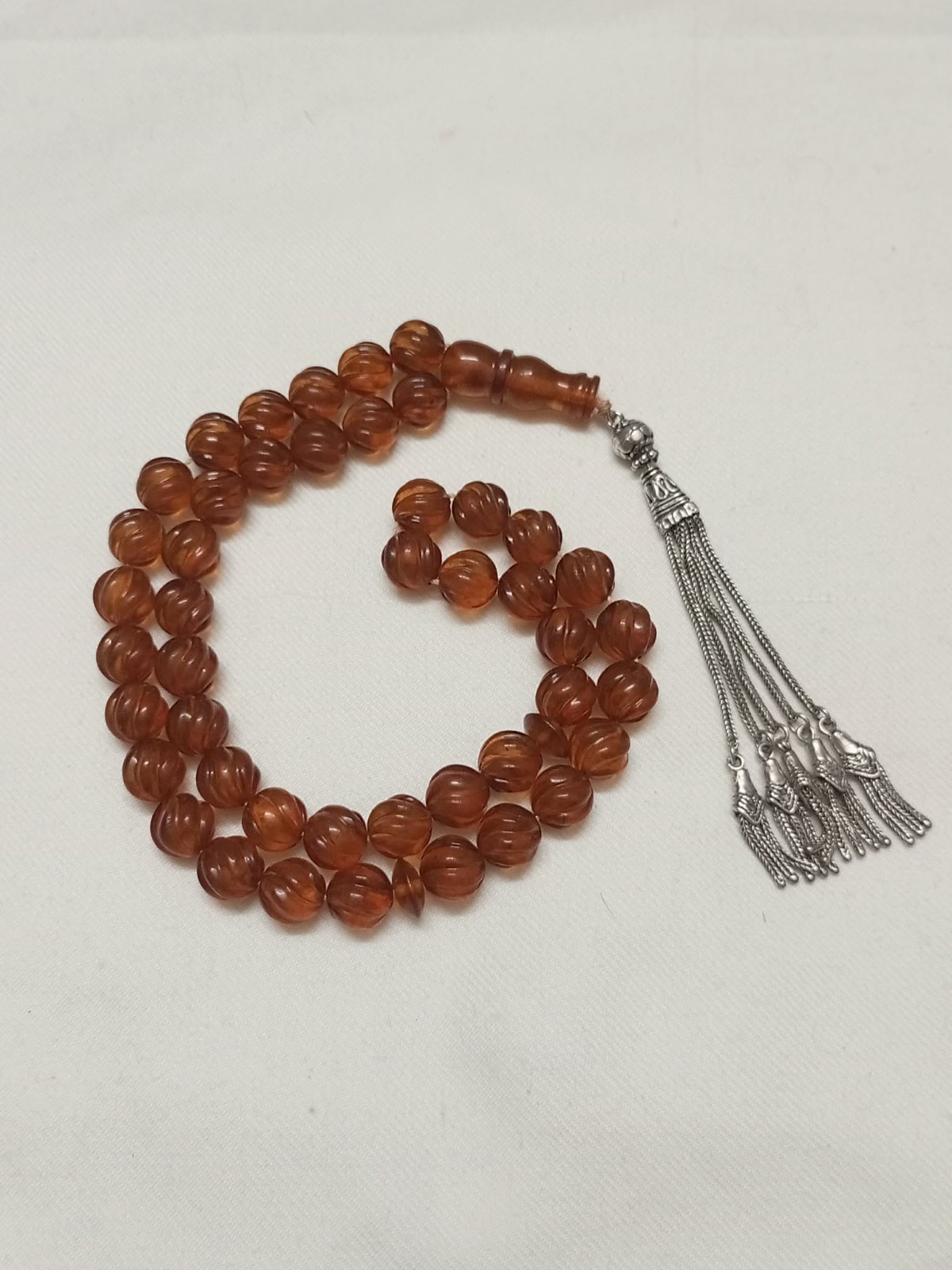 Natural amber rosary in transparent honey colour, old Melon cut