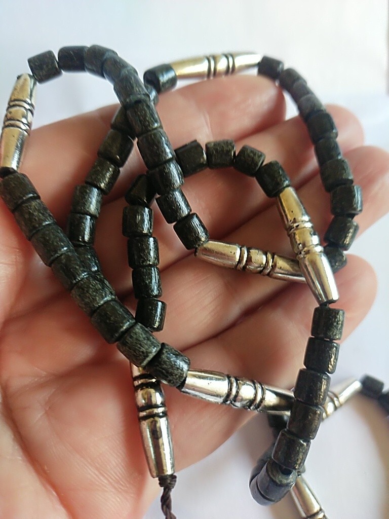 Rosary, strange shape, made of wood and plastic, 78 beads,، Black with silver c