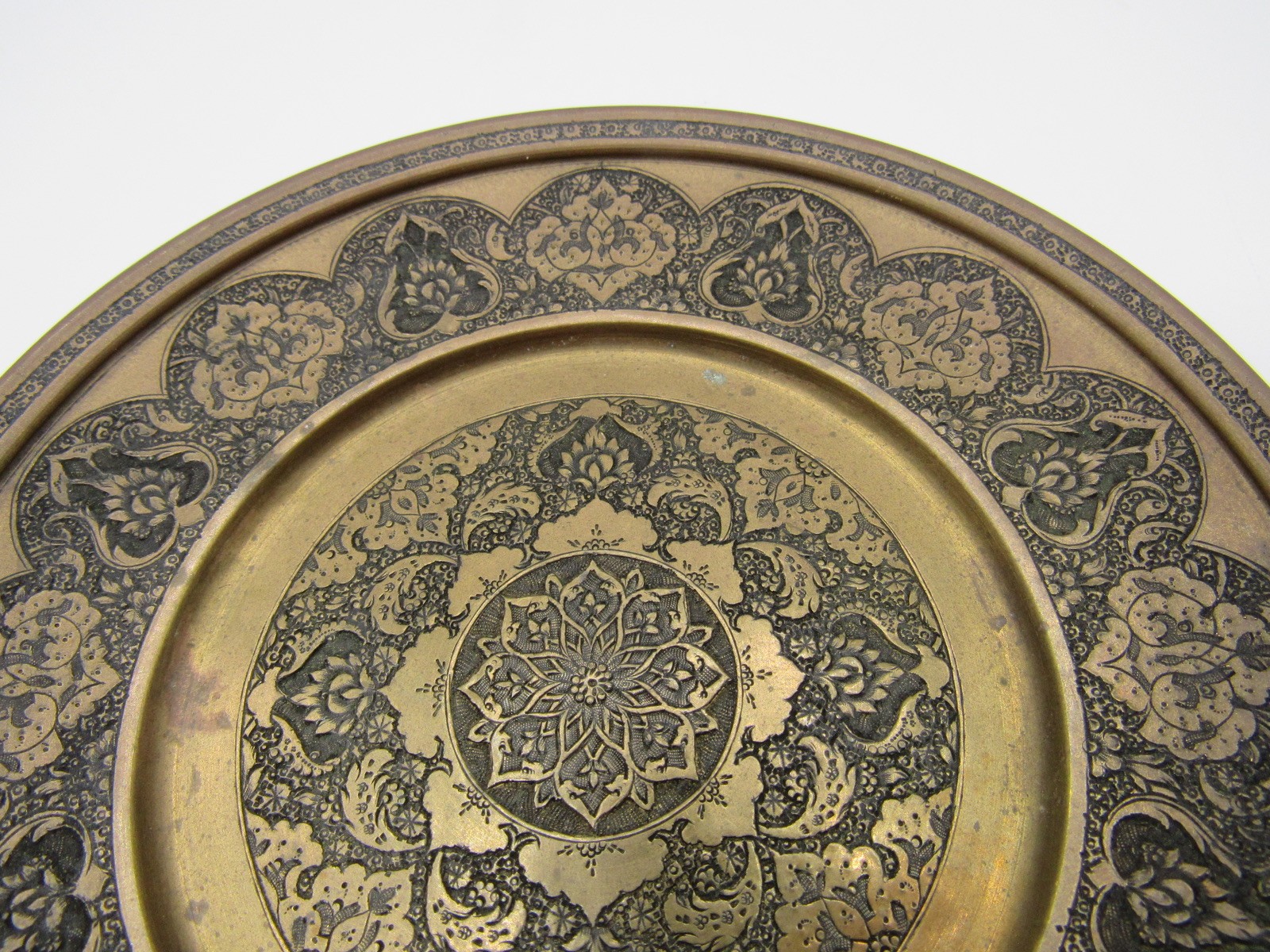Ornately engraved brass plate with Arabic hallmark Islamic 6 3/8″