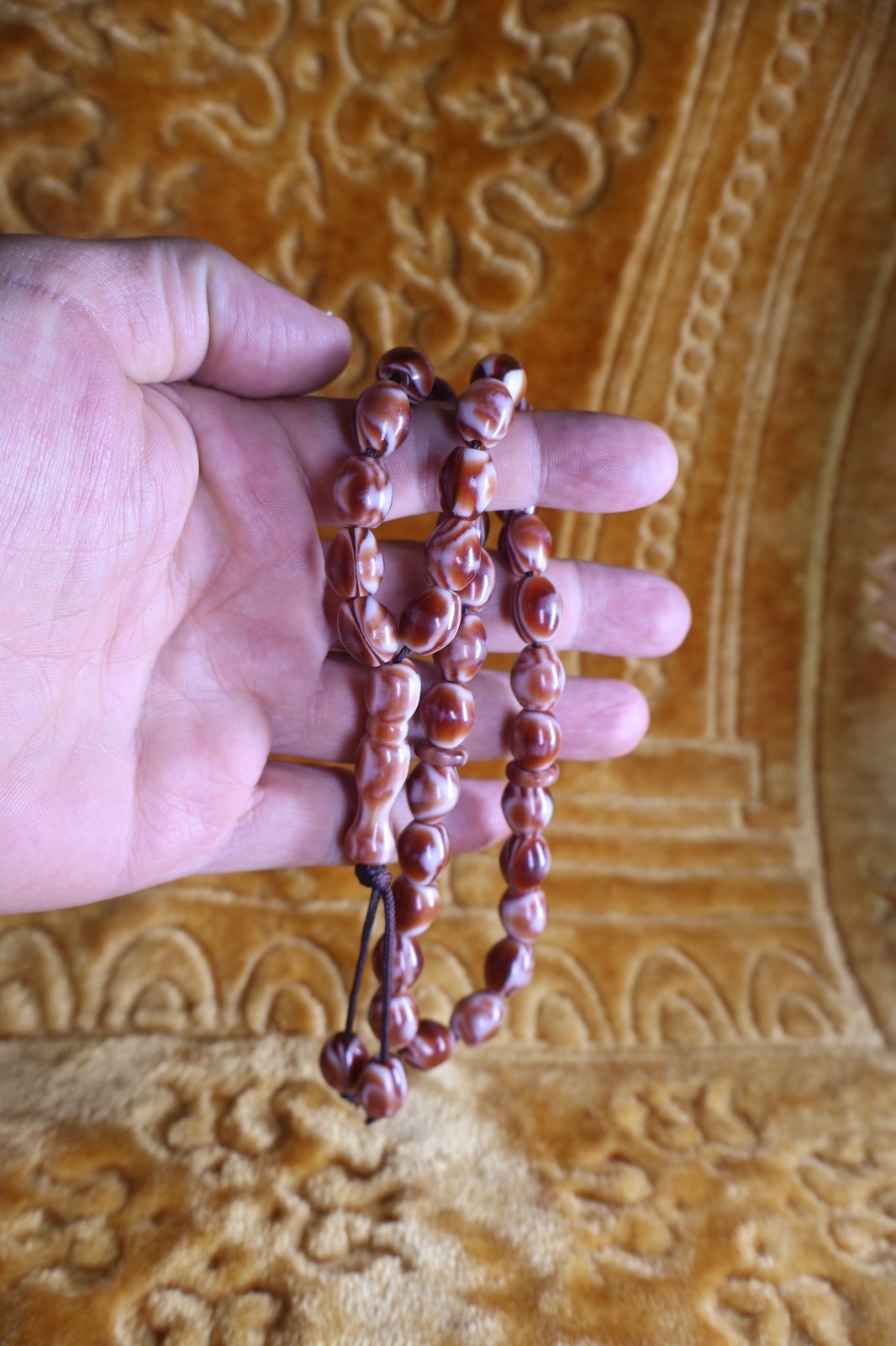 A collection of various antique prayer beads