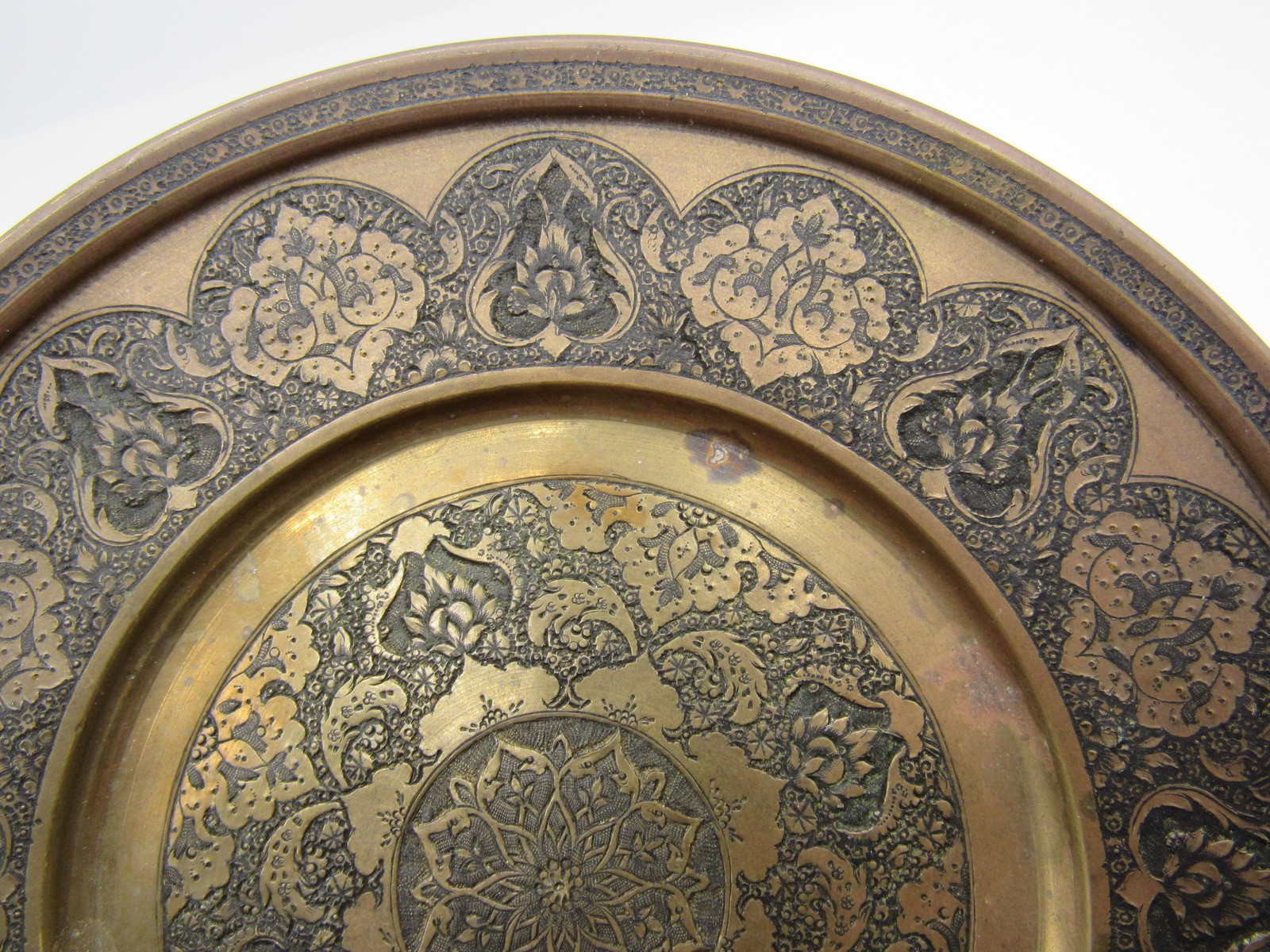 Ornately engraved brass plate with Arabic hallmark Islamic 6 3/8″