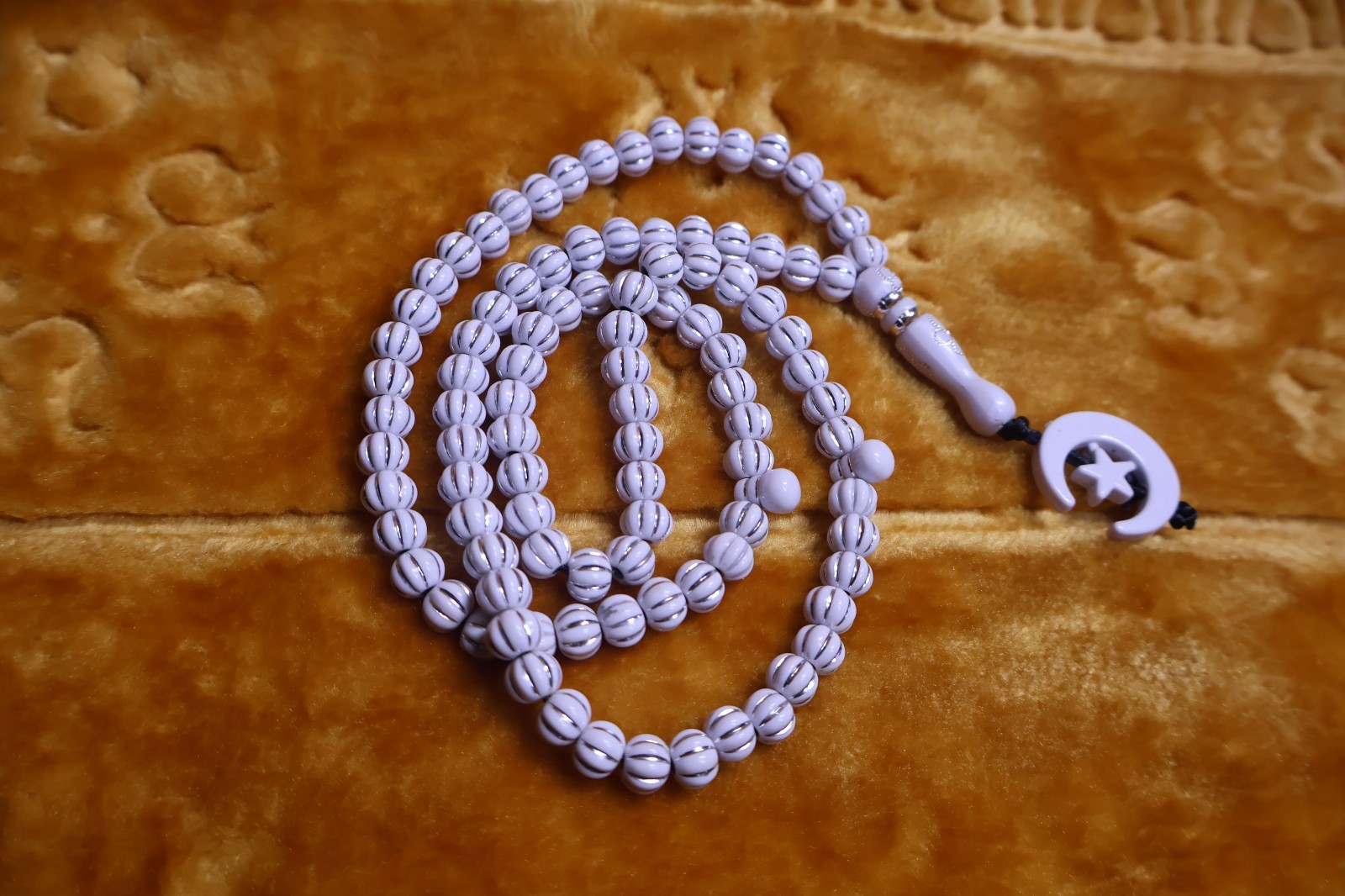 A collection of various antique prayer beads