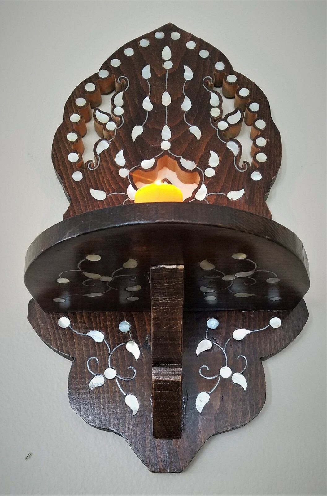 A Gorgeous wooden wall for hanging oil lamp or candles,moth mother of Pearl .