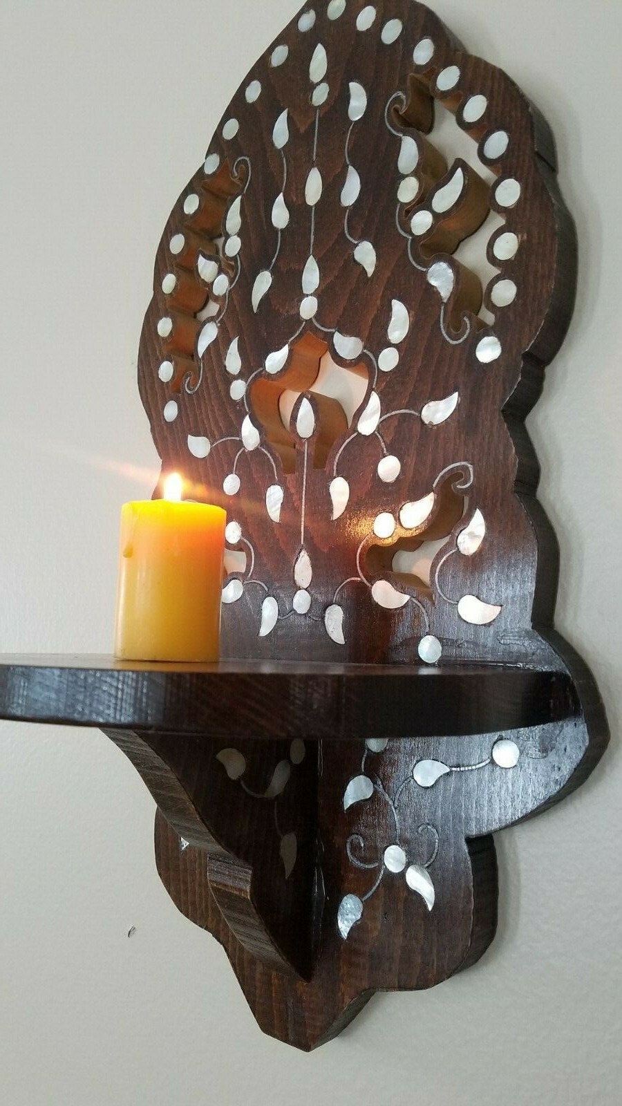 A Gorgeous wooden wall for hanging oil lamp or candles,moth mother of Pearl .