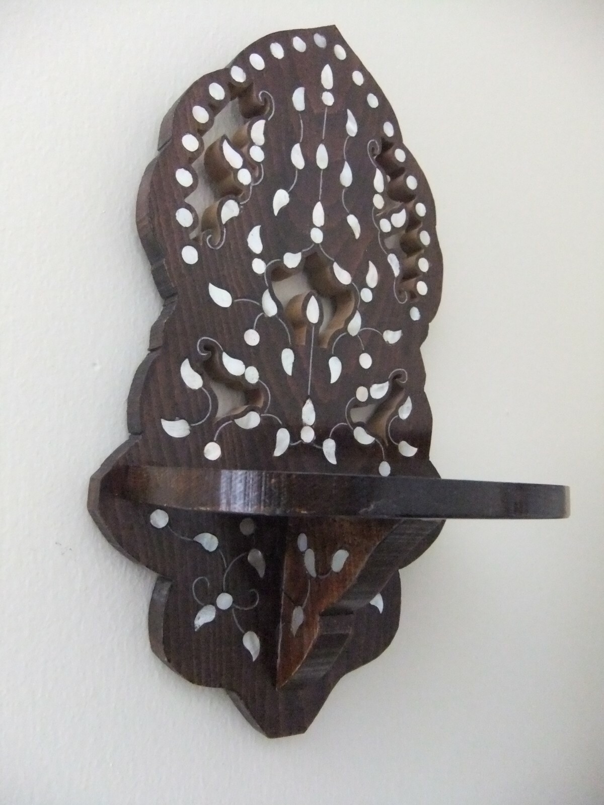 A Gorgeous wooden wall for hanging oil lamp or candles,moth mother of Pearl .