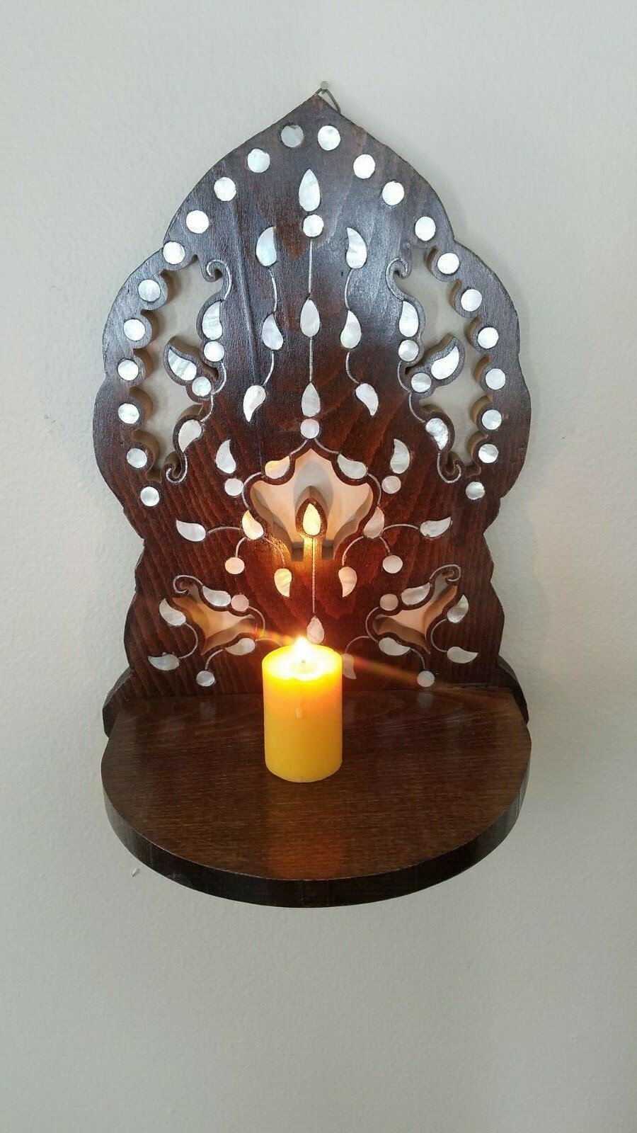 A Gorgeous wooden wall for hanging oil lamp or candles,moth mother of Pearl .