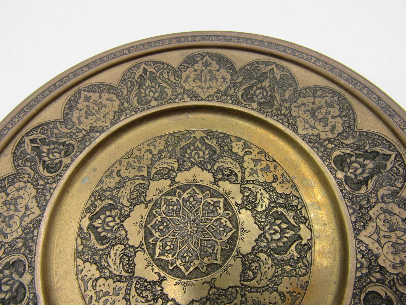 Ornately engraved brass plate with Arabic hallmark Islamic 6 3/8″