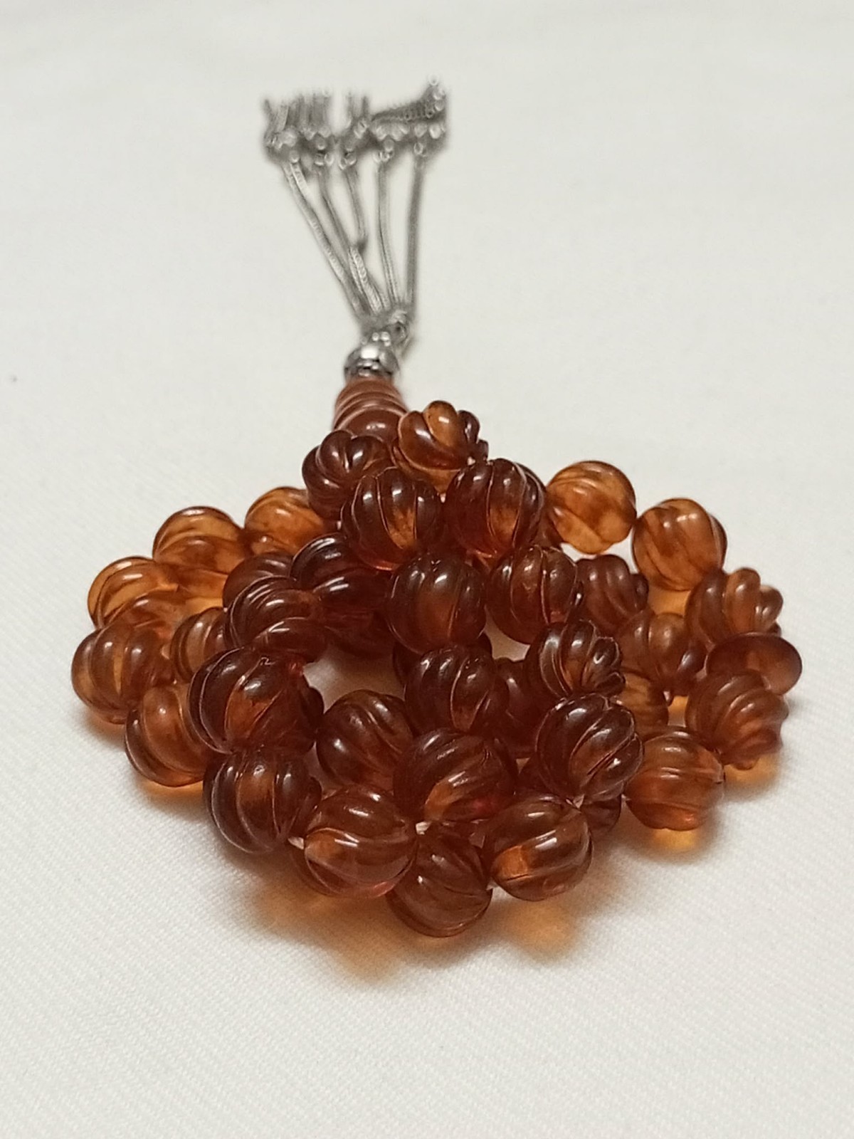 Natural amber rosary in transparent honey colour, old Melon cut