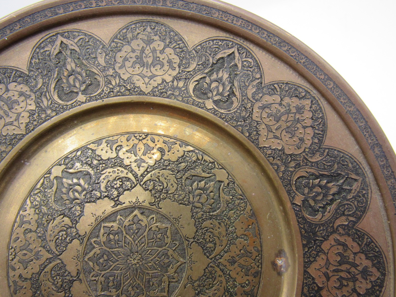 Ornately engraved brass plate with Arabic hallmark Islamic 6 3/8″