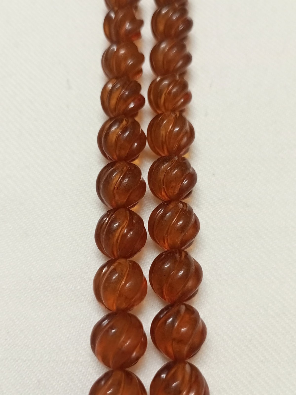 Natural amber rosary in transparent honey colour, old Melon cut