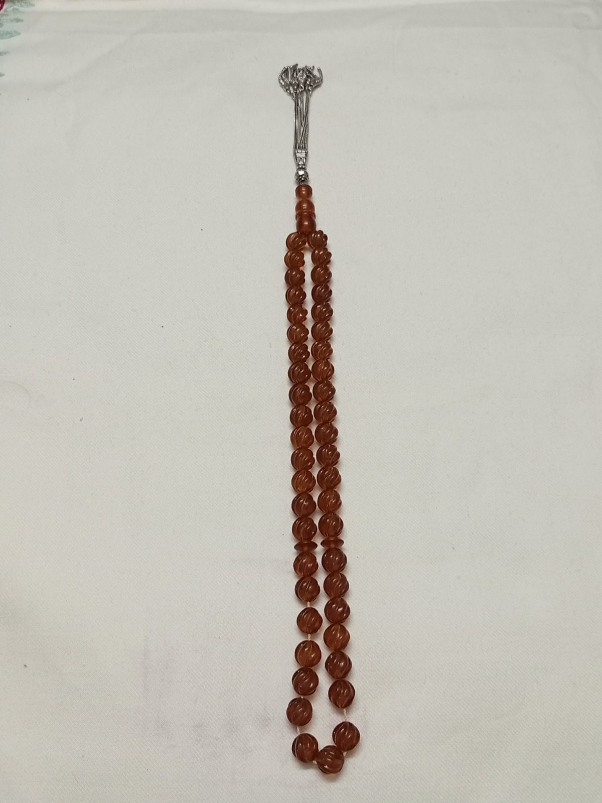 Natural amber rosary in transparent honey colour, old Melon cut