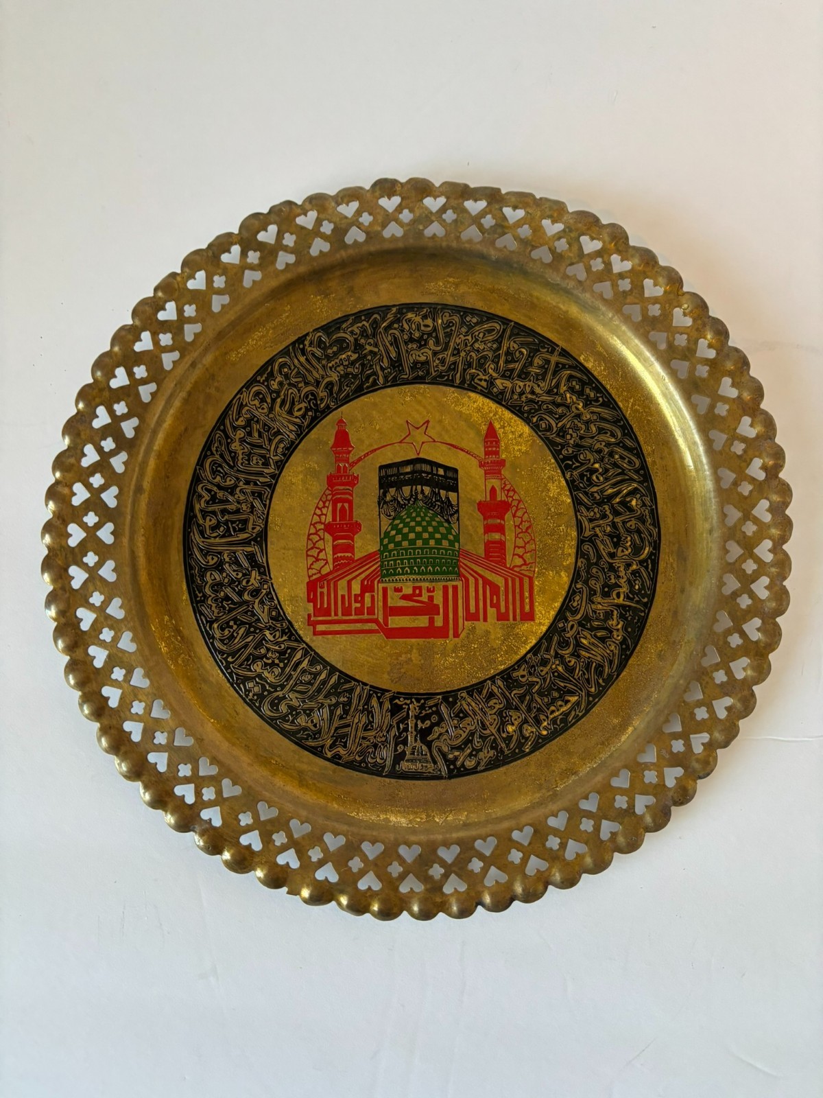 decorative brass plate featuring the Kaaba and Islamic calligraphy 10″