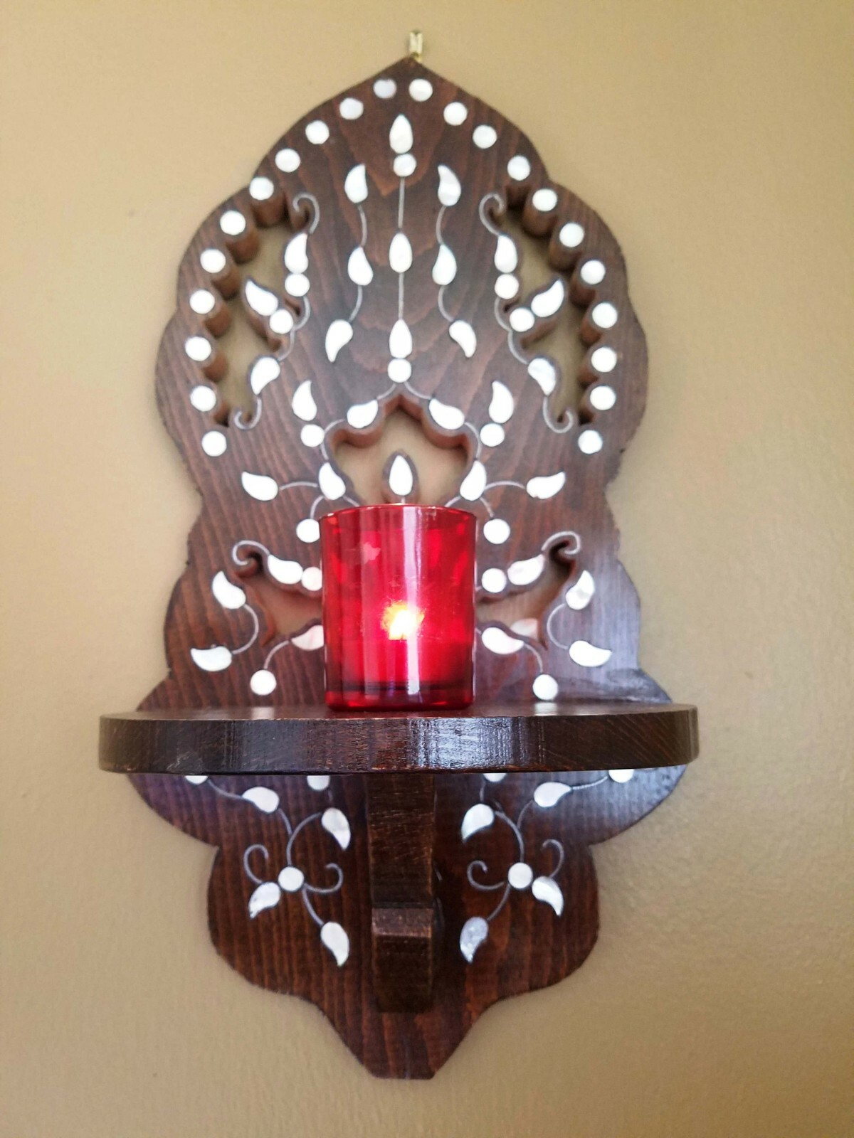 A Gorgeous wooden wall for hanging oil lamp or candles,moth mother of Pearl .